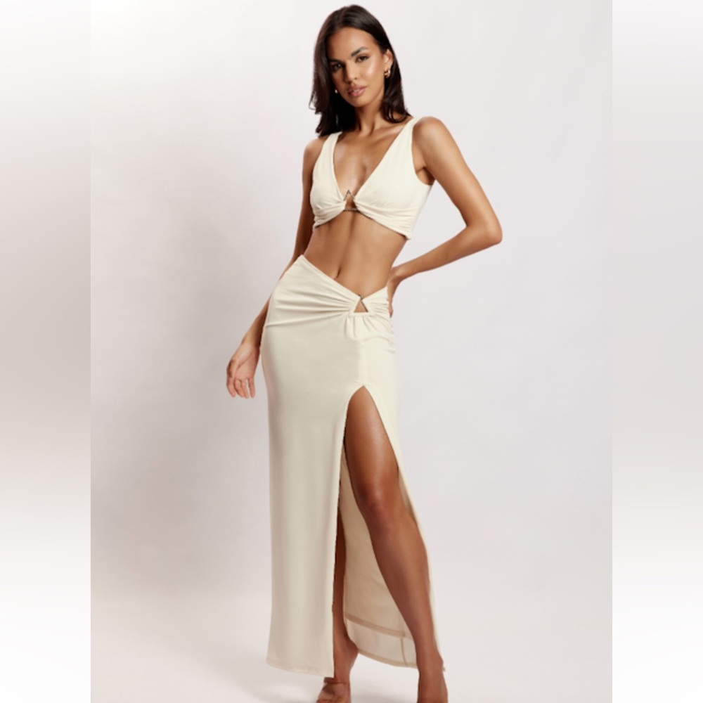 High-Slit Cream Maxi Skirt with Twist Detail